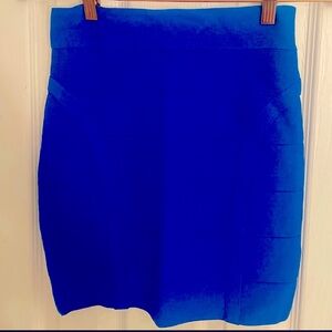 Bebe Bodycon skirt. Royal blue with gold zipper. Size S, only worn once.